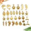 Gold-Tone Mermaid and Turtle Shell Charms with 15 Listed Options view 1
