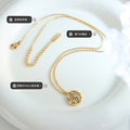 Hollow Xi Round Pendant Necklace Gold Rose Steel Tones view 2