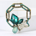 Bow and Chain Brooch in Metal with Geometric Crystal Bow with a Dangling Chain and Pearl view 4