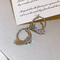 Crystal Wing and Star Hoop Earrings in Two Metal Tones view 6