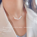 Gold Tone Chain Necklace With Graduated White Pearl Curved Centerpiece view 3