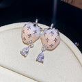 Ivory Strawberry Drop Earrings with Silver Floral Details view 6