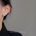 Translucent Blue Five Petal Flower And Pearl Center Stud Earrings view 2