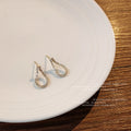 Clear Rhinestone Open Teardrop Stud Earrings Gold Tone view 3