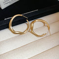 Irregular Rounded Hoop Earrings In Gold And Silver view 6