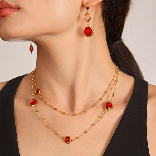Red teardrop and triangle glass station necklace worn as double layer