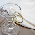 Faceted Open C Gold and Silver Medium Hoop Earrings view 2
