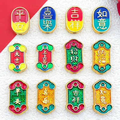 Colorful spacer bead beads arranged on a light background