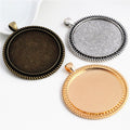 Round Metal Cabochon Pendant Trays in Fifteen Frame Styles view 1