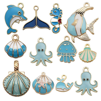 Colorful starfish and octopus charms arranged on a light background