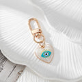 Gold Tone Evil Eye Printed Heart Lobster-Clasp Charms in Six Designs view 5