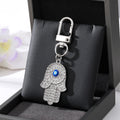 Gold and Silver Tone Crystal Hamsa Hand Evil Eye Clip Keychains in Ten Designs view 10