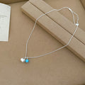 Silver Tone Apple Pendant Necklaces in Blue and White view 6