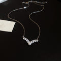 Silver Tone Crystal Chevron Necklace With Pearl Drop view 6
