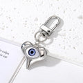 Gold and Silver Tone Geometric Hamsa and Eye Clip Keychains view 10