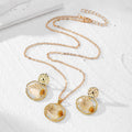 Gold Tone Irregular Pressed Flower Necklace and Stud Earrings view 5