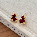 Burgundy Gourd Shape Stud Earrings With Gold Tone Trim view 3