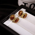 Oval Cabochon Pearl Look Border Gold Stud Earrings view 3