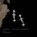 Silver Tone Clear Stone Fleur De Lis Long Drop Stud Earrings view 3