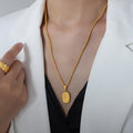 Oval Embossed Flower Pendant Necklaces Gold Steel Figaro Rope view 4