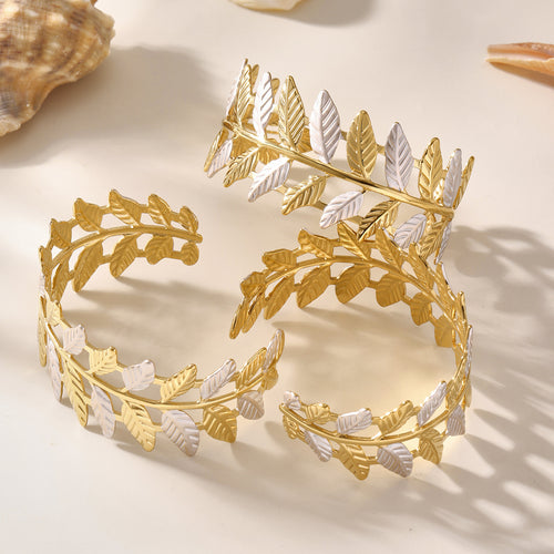 Three gold silver leaf vine open cuffs with seashells