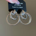 Textured Interlocking Circle and Knot Stud Earrings view 9