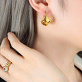 Geometric Twisted Hoop Earrings Gold And Steel Tone Pair view 3
