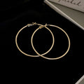 Minimal Thin Round Hoop Earrings in Gold and Silver view 9