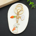 Thirteen White and Pink Rabbit Floral Metal Keychain Designs view 4