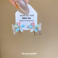 Silver Blue Butterfly Slider Bracelet and Flower Hoop Earrings view 4