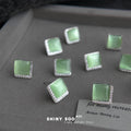 Silver Tone Pale Green Square Stone Clear Corner Halo Stud Earrings view 1