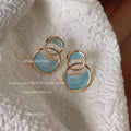 Gold Blue Enamel Interlocking Abstract Double Curve Studs view 1