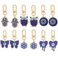 Twelve Piece Gold Tone Owl Heart Butterfly Evil Eye Keychain Set view 1