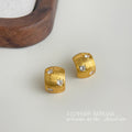 Brushed Curved Clear Stone Stud Earrings In Silver And Gold Tone view 3
