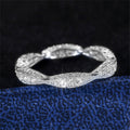 Twisted Pave Eternity Band Ring In Gold And Silver Tones view 2