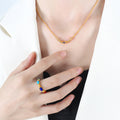 Curved Bar Inlay Necklace Gold Onyx Lapis Tiger Eye view 1