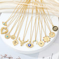 Gold Tone Vintage Motif Pendant Necklaces in Twelve Eye and Symbol Designs view 1