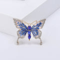 Enamel Butterfly Brooch With Polished Metal And Sculpted Decorative Details view 5