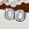 Rectangular Open Halo Stud Earrings in Two Finishes view 2