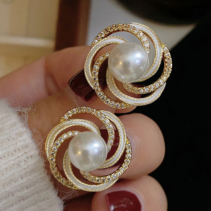 Gold Pearl Swirl Stud Earrings With Crystal Accents