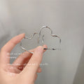 Silver Twisted Open Heart Huggie Hoop Earrings Outline view 6