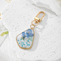 Irregular Pressed Flower Resin Keychains in Six Designs view 2