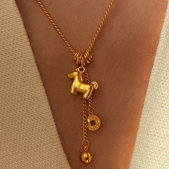 Gold Tone Horse Coin and Bell Tassel Pendant Necklace