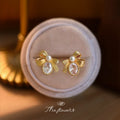 Gold-Tone Ribbed Bow Pearl Oval Clear Stone Stud Earrings view 1