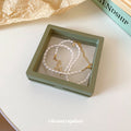 Olive Green Floating Jewelry Display Box And Matching Paper Sleeve view 2