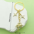 Celestial Charm Keychains Featuring Gold-Tone Stars Across 15 Pictured Variations view 3