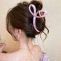 Marbled Loop Acrylic Hair Claw In Pale Pink Or Black view 1