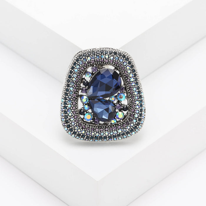 Geometric Silver Tone Brooch With Two Large Blue Teardrop Crystals