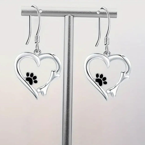 Second product view showing silver-tone cat-tail heart and paw-print hook earrings