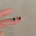 Gold Tone Black Oval Stone Clear Halo Mini Stud Earrings view 1